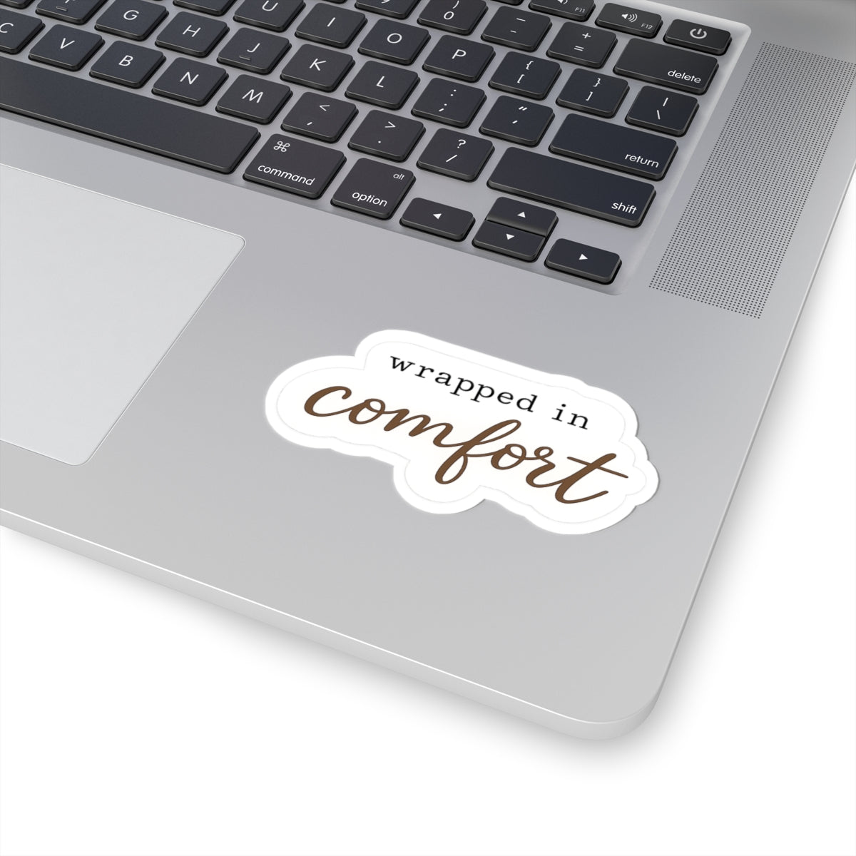 Wrapped in Comfort Sticker — Cozy Script Kiss-Cut Vinyl Sticker